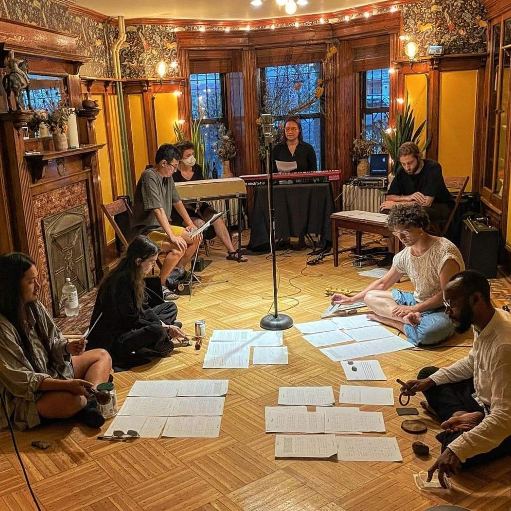 Temporary Ensemble playing "Changing the System" at Underland Gallery, Brooklyn NY August 10, 2022. From the left: Teerapat Parnmongkol, Lucie Vítková, Leo Chang, Elizabeth Adams, Melinda Faylor, Drew Wesely, Mae May and Kwamé Sorrell. PC James Ilgenfritz